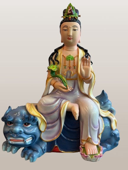 Porcelain Seated Quan Yin on Lion 11"